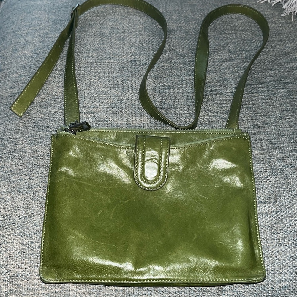 Leather HOBO crossbody 9x7 inches with many compartments.